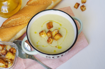 Bowl of vegetable soup. Cauliflower soup puree with croutons.