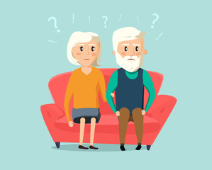 Worry old senior man and woman  seating together on sofa in the room