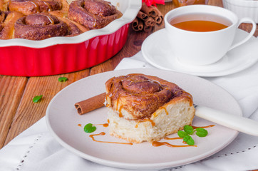 Cinnabon. Yeast buns with cinnamon and caramel sauce.