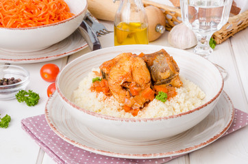 Fish stewed in tomato sauce with vegetables