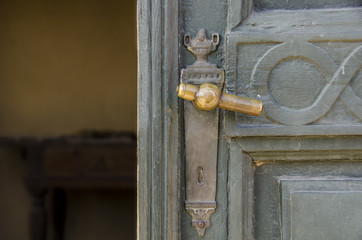 Old vintage door that is open to `past` time interior
