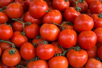 Fresh ripe red tomatoes in a market