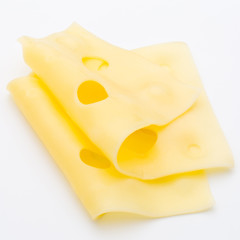Cheese slices on white background cutout.