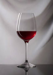 Wine. Glass of wine on gray background