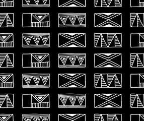 Seamless vector pattern. Black and white geometrical background with hand drawn decorative tribal elements. Print with ethnic, folk, traditional motifs. Graphic vector illustration.