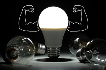 Led light bulb with inflated arms and lay next to incandescent bulbs in the dark