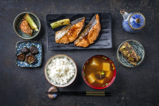 Traditional Japanese dish with Fish Teriyaki and Soup as close-up in bowls