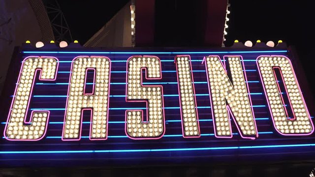 Large bright flashing Casino sign to attract players.

