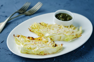 Roasted cabbage with mint sauce