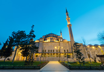 Fototapeta na wymiar Exterior low angle night shot of Fatih Mosque, an Ottoman imperial mosque located on the Third Hill of Istanbul, Turkey