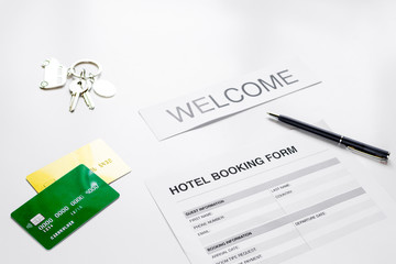 reservation form on hotel reception desk background