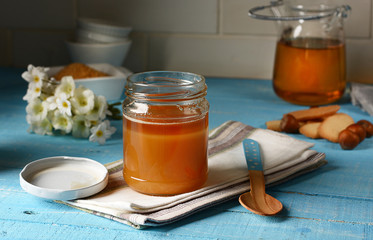 Organic honey in glass jar
