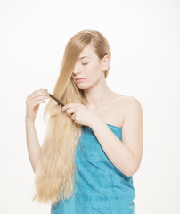 Obraz premium Young tender girl with long blond hair