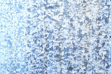 Background of a rusty old iron metal sheet, blue and gray colors