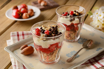 Strawberry desserts with sponge cake and vanilla cream