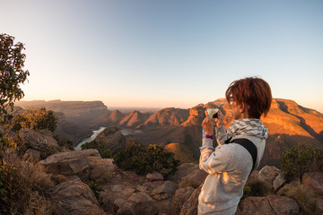 Blyde River Canyon, famous travel destination in South Africa. Tourist looking at panorama with...