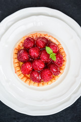 Raspberry Tarts with Mint Leaves