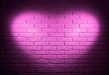Fototapeta na wymiar pink brick wall with heart shape light effect and shadow, abstract background photo