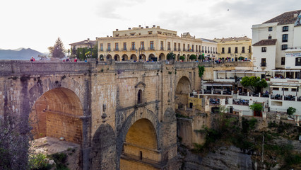 Obraz na płótnie Canvas New bridge of Ronda, located on the Tajo de Ronda. Throat excavated by the Rio Guadalevín.