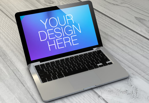 Laptop on Wooden Surface Mockup 1