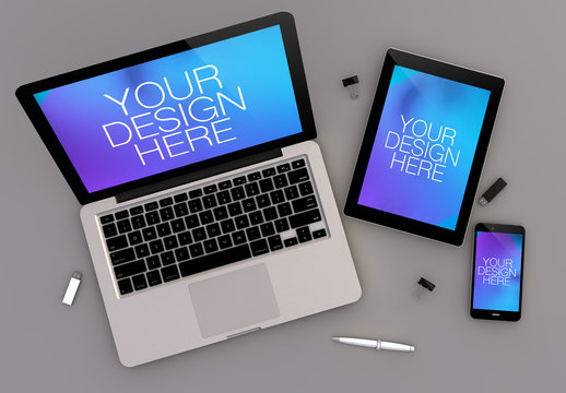 Top View Mockup of Devices and Computer on Gray Background