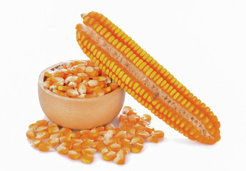 Corn in a wooden bowl on a white background