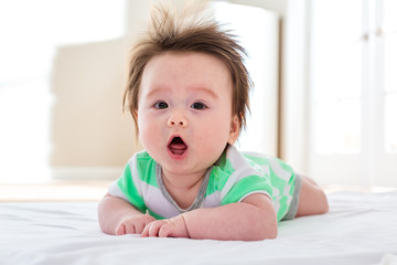 Happy baby boy smiling