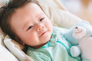 Happy baby boy smiling