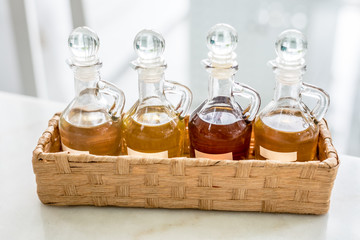 Fototapeta na wymiar Different varieties of Syrup in glass jars for Coffee, Tea, Dessert