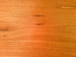 Fototapeta premium Smooth wooden texture with natural grain patterns and warm tones, perfect for backgrounds and design projects.