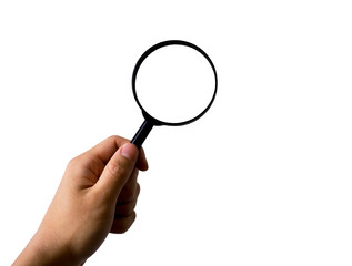 Hand holding magnifying glass, isolated on white background, with clipping path