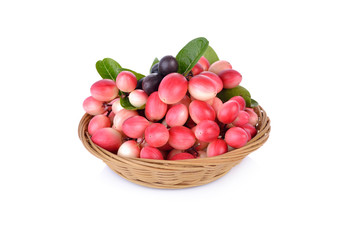 Bengal-Currants, Carandas-plum, Karanda fruit with leaf in bamboo basket and on white background