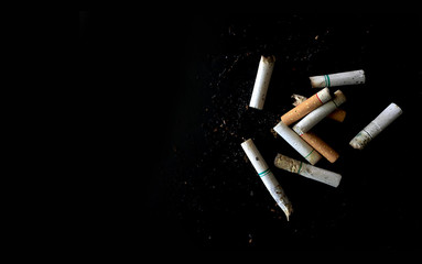 world no tobacco day concept. cigarettes in the hands of men  with soft-focus in the background. over light