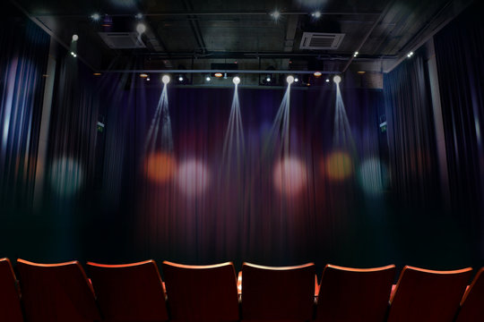 theater before showtime , empty auditorium with seats