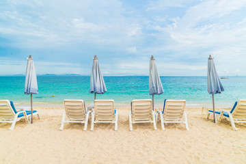 Beautiful luxury umbrella and chair on beach