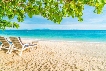 Beautiful luxury umbrella and chair on beach