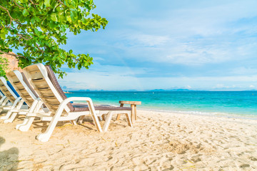 Beautiful luxury umbrella and chair on beach