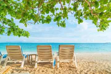 Beautiful luxury umbrella and chair on beach