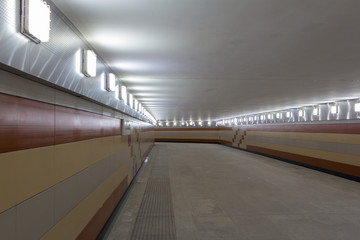 Long pedestrian tunnel, modern crossing, led lights