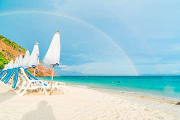 Beautiful luxury umbrella and chair on beach