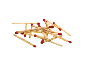 Matches isolated on white background. Closeup shot.