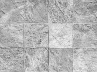 Obraz premium Closeup surface brick pattern at brick stone wall textured background in black and white tone