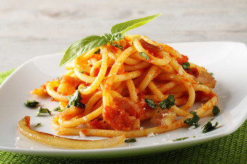 Bucatini Amatriciana, with parmesan cheese, tomato and bacon