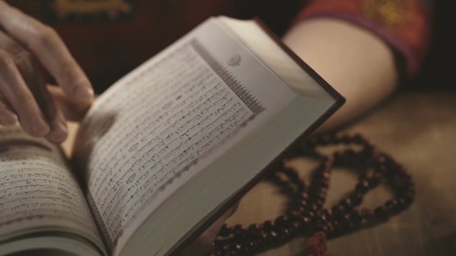 Muslim women reading Holy Quran