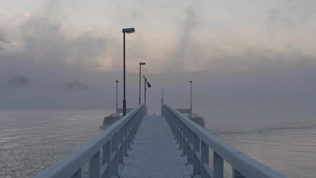 Cold misty winter morning by the coast of Helsinki  