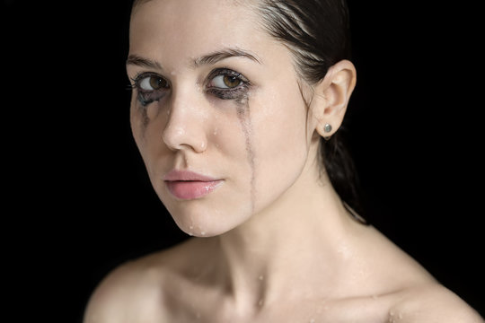 Studio portrait of wet woman