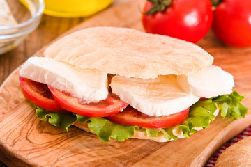 Puccia bread with mozzarella and tomato.