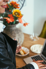 Woman at laptop in cafe