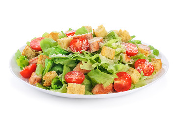 Caesar salad on white background.