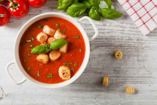 Traditional tomato soup, served with croutons.